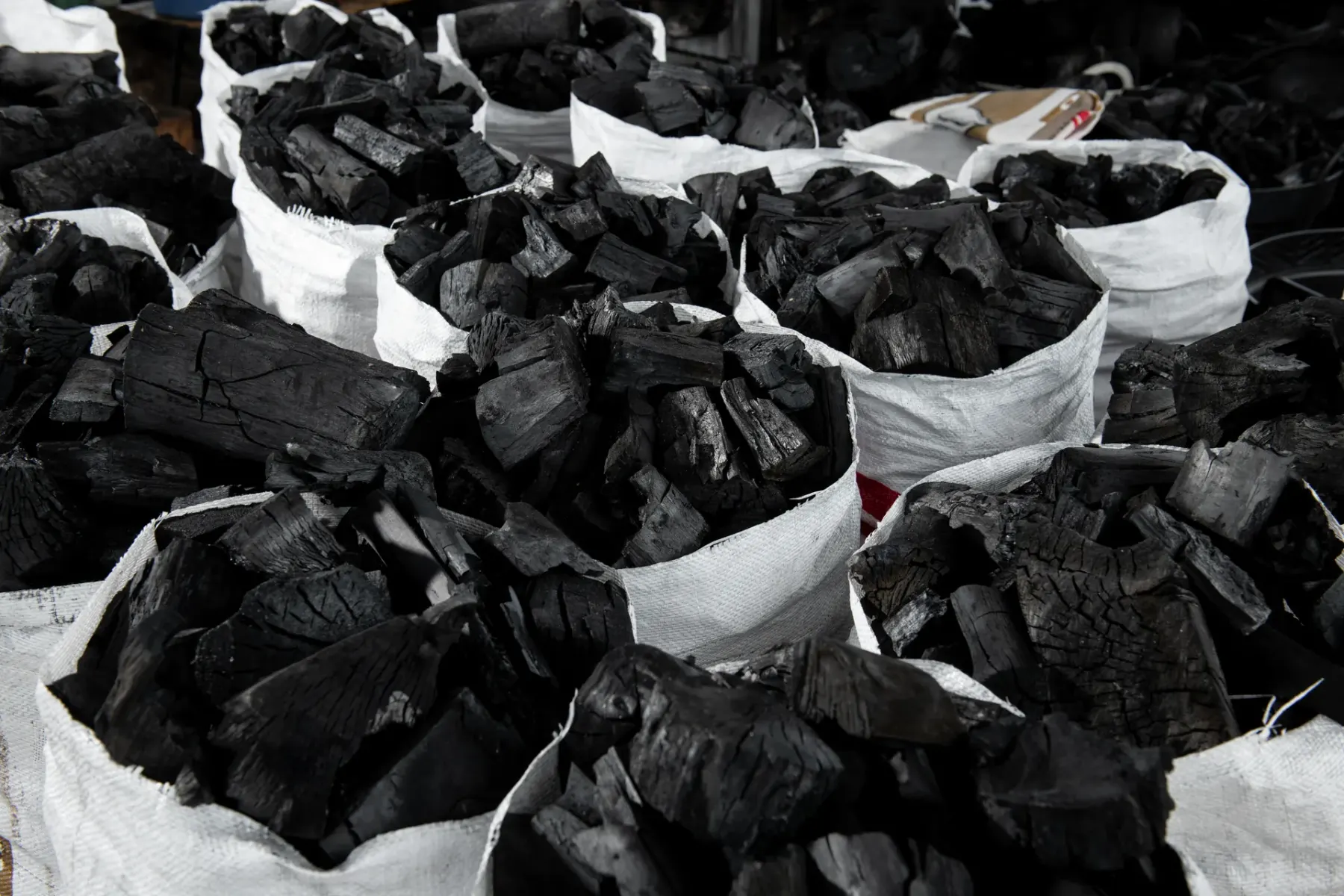 Charcoal ready for packing in woven sacks
