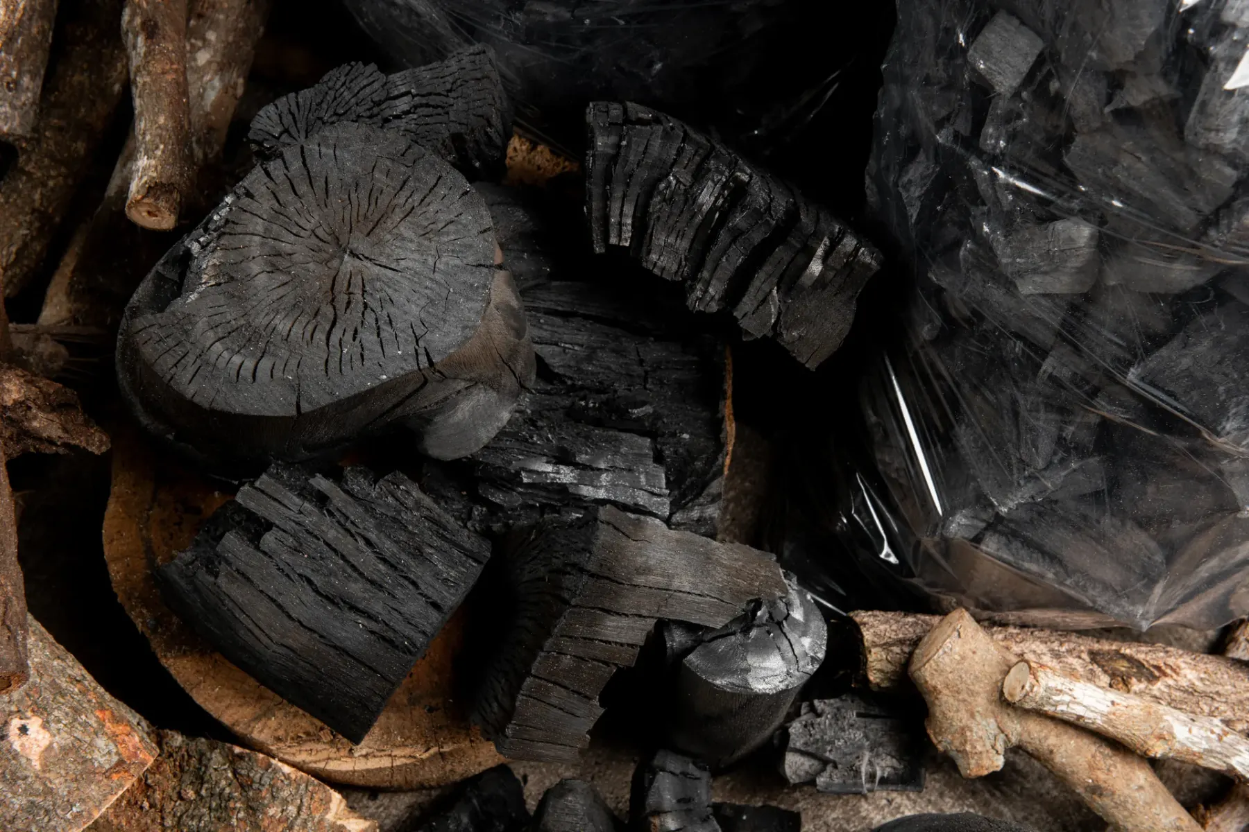 Dense hardwood charcoal, cut face