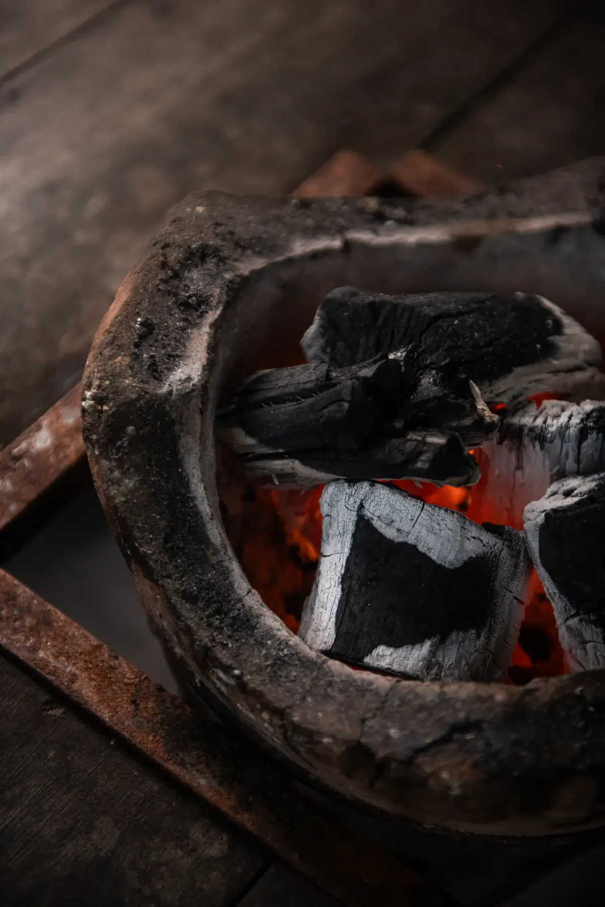 Lump charcoal glowing in a stove