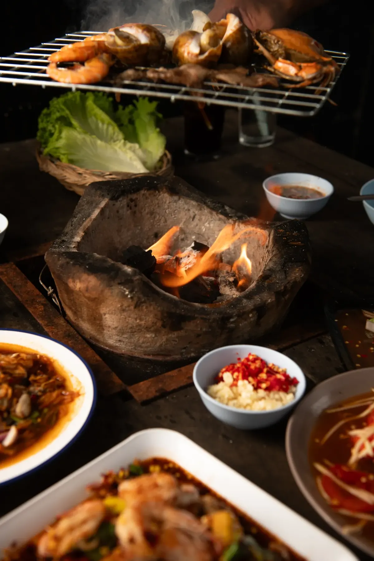 Charcoal grill cooking seafood
