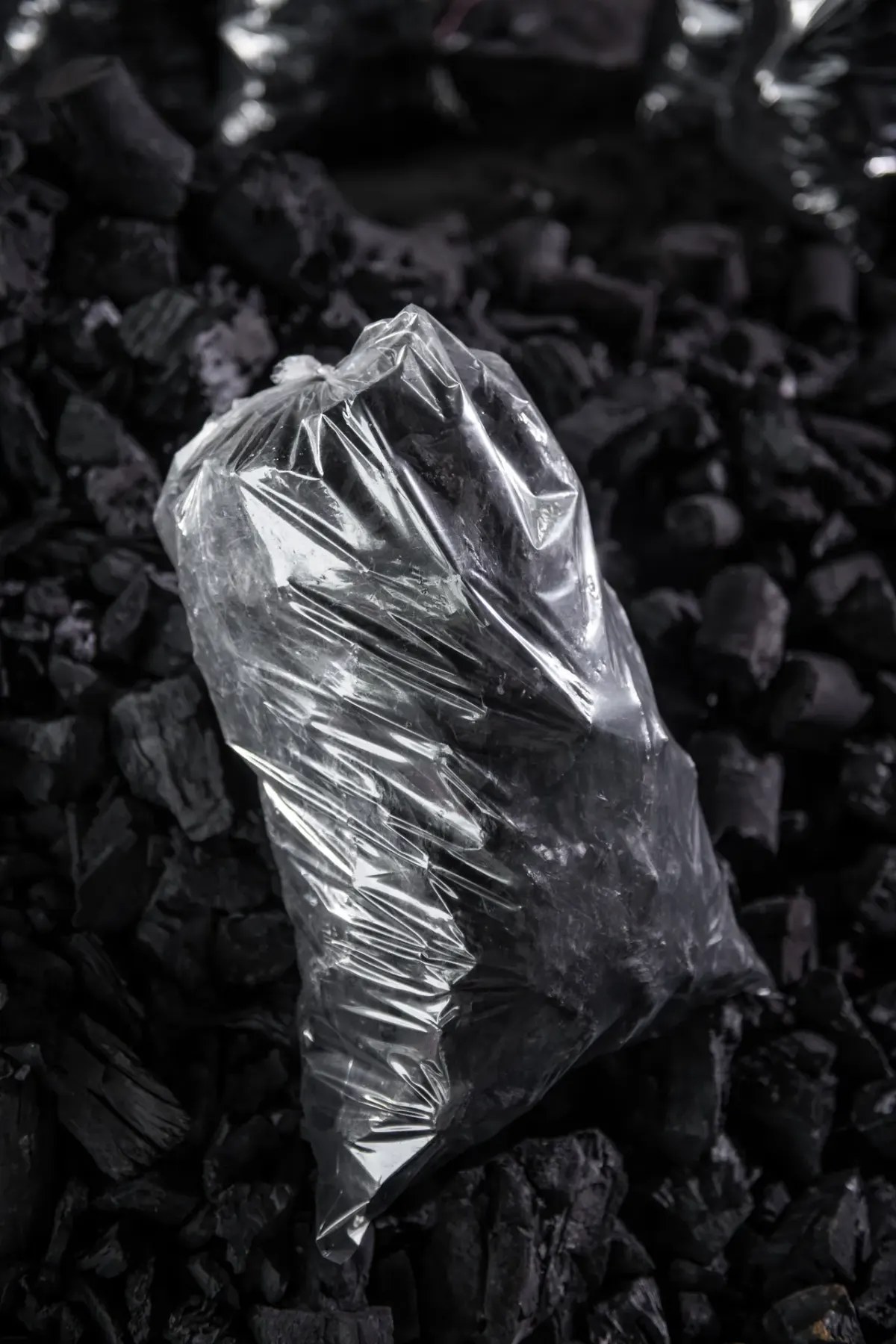 Sealed bag of lump charcoal